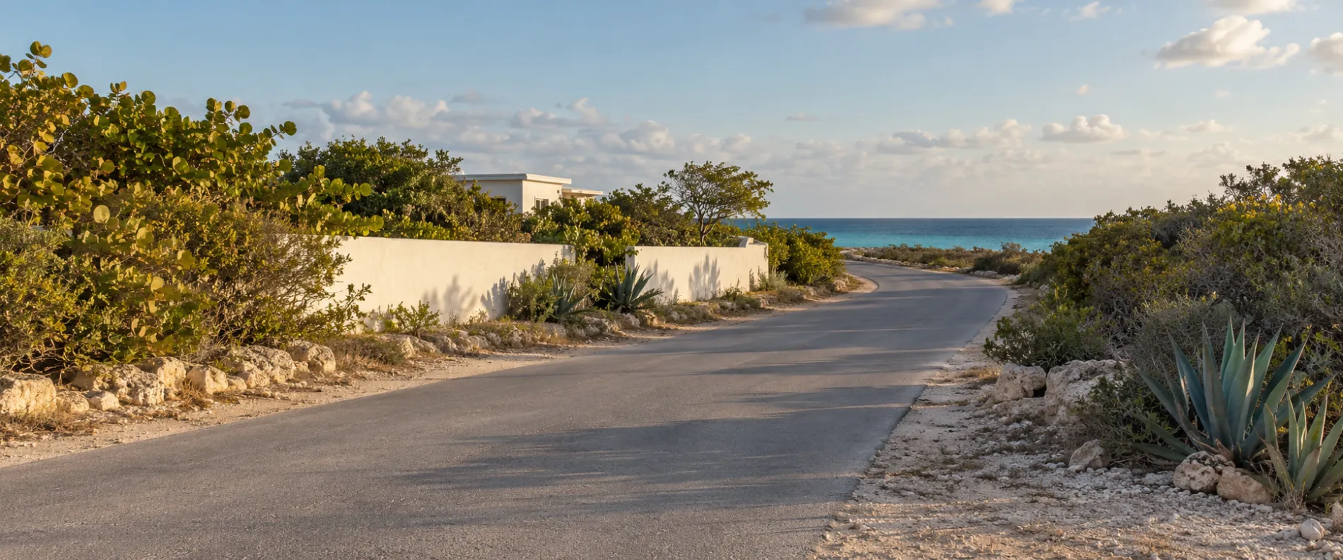A quiet road on Anguilla running down to the sea
